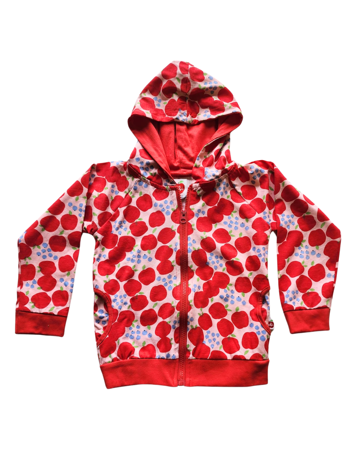 The Sweet Apple Zadie Jacket for kids features a red polka dot pattern, front zipper, cozy hood, and long sleeves.