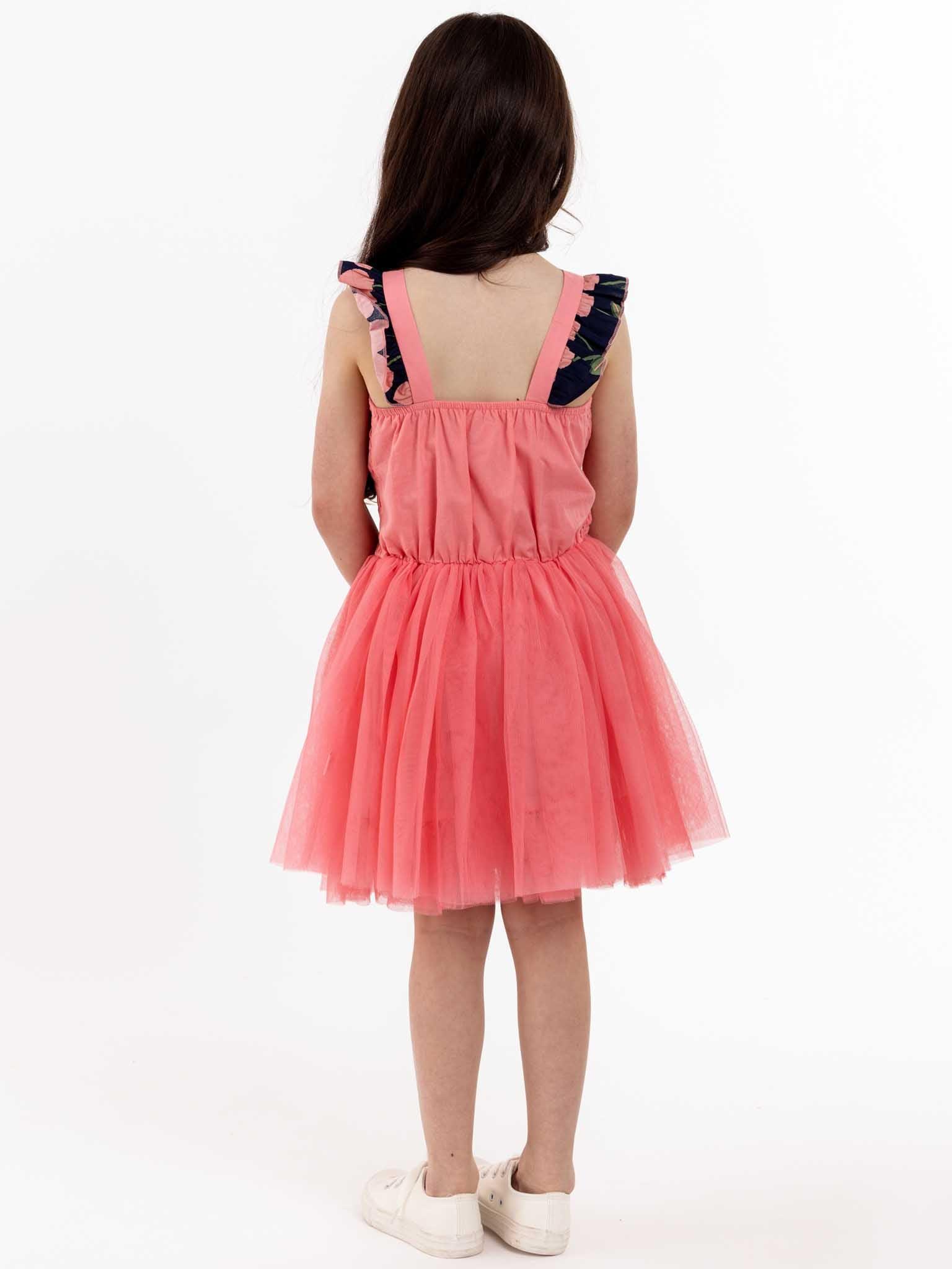 A twirl-approved little girl wearing a beautiful Navy Cherry Belle Tutu Dress.