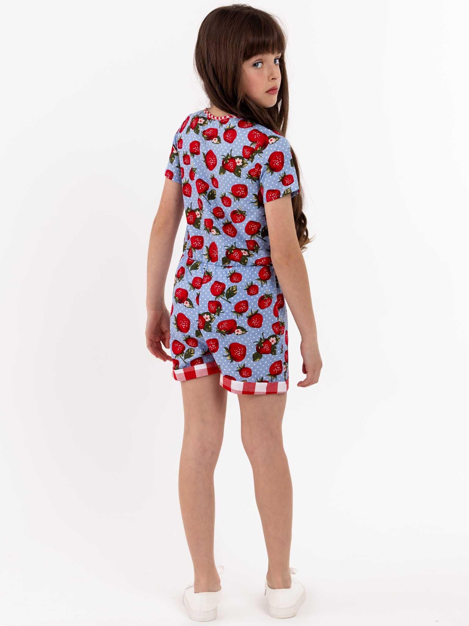 An easy-to-wear Strawberry Fields Maisy Playsuit in a blue and red polka dot pattern.